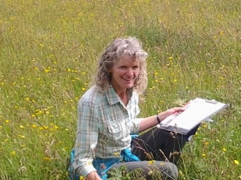 Photo of Katy Haines in a meadow