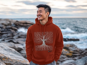 Image of young man wearing hoodie with tree and root design 