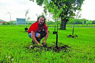 Volunteer tree planting on the Wrexham Industrial Estate Living Landscape