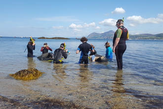Young people snorkelling 