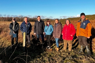 A group of people on Anglesey fens