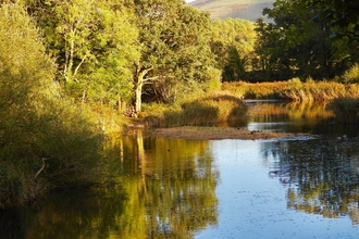 Photo of the Spinnies Aberogwen Nature Reserve's lagoon