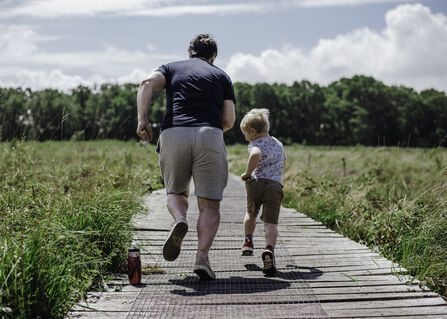 Father and son playing