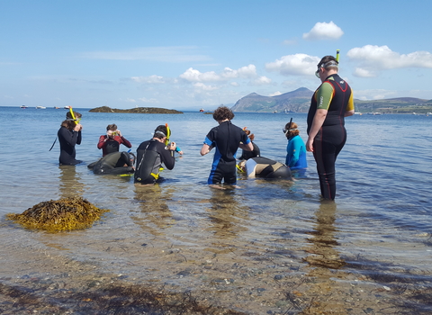 Young people snorkelling 