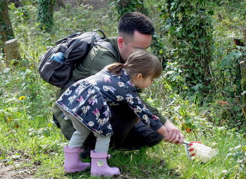 Image of father and daughter exploring