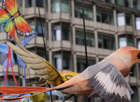 A bird puppet at Restore Nature Now march