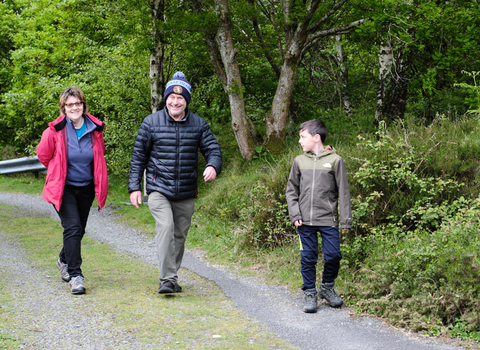 Photo of man, woman, boy walking at Gwaith Powdwr Nature Reserve